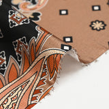 Satin polyester imprimé patchwork et cachemire marron fond noir