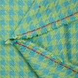 Tweed de polyester pied de poule anis fond turquoise