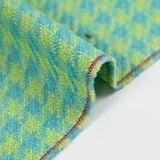 Tweed de polyester pied de poule anis fond turquoise
