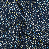 Viscose imprimée galets jaune rose et bleu fond marine