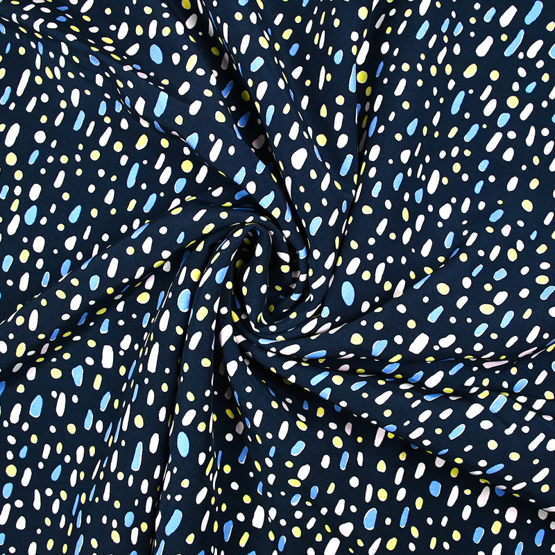 Viscose imprimée galets jaune rose et bleu fond marine