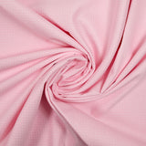 Coton imprimé pois 1mm fond rose clair