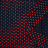 Maille polyviscose floquée pois rouge fond bleu marine