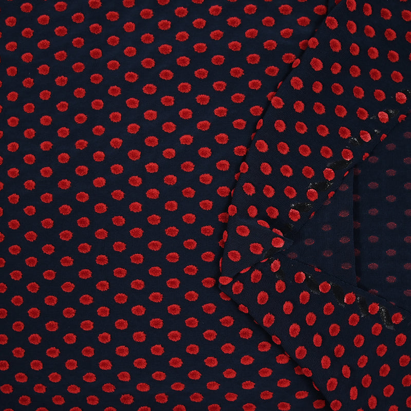 Maille polyviscose floquée pois rouge fond bleu marine