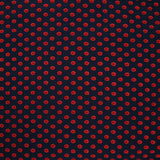 Maille polyviscose floquée pois rouge fond bleu marine