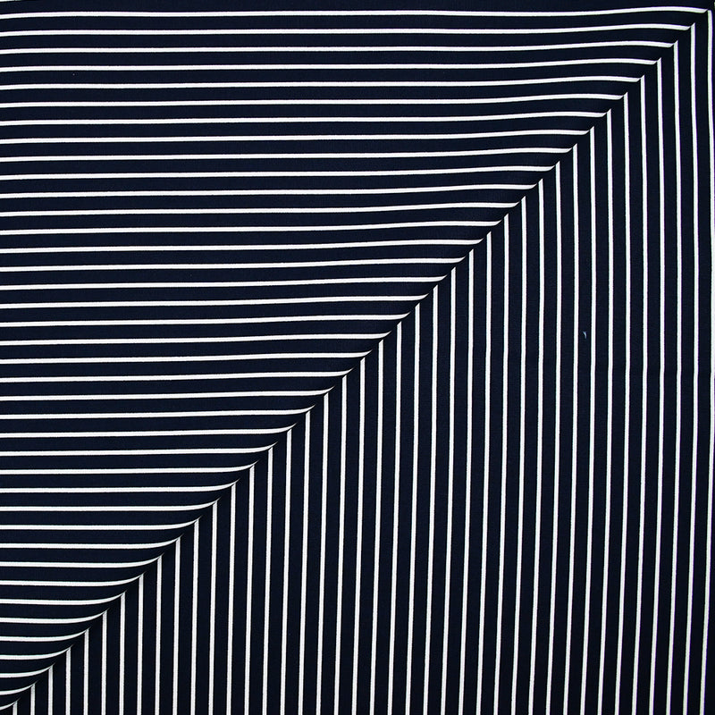 Popeline de coton imprimée rayure blanche fond bleu marine