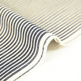 Polycoton tissé teint rayé bleu marine fond écru