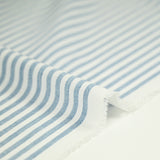 Coton tissé teint rayure bleue fond blanc