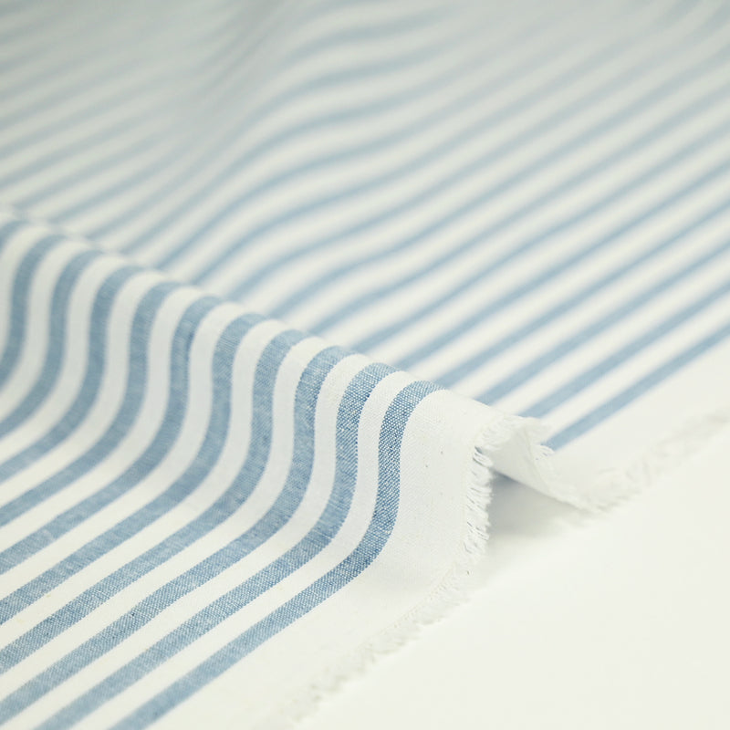 Coton tissé teint rayure bleue fond blanc