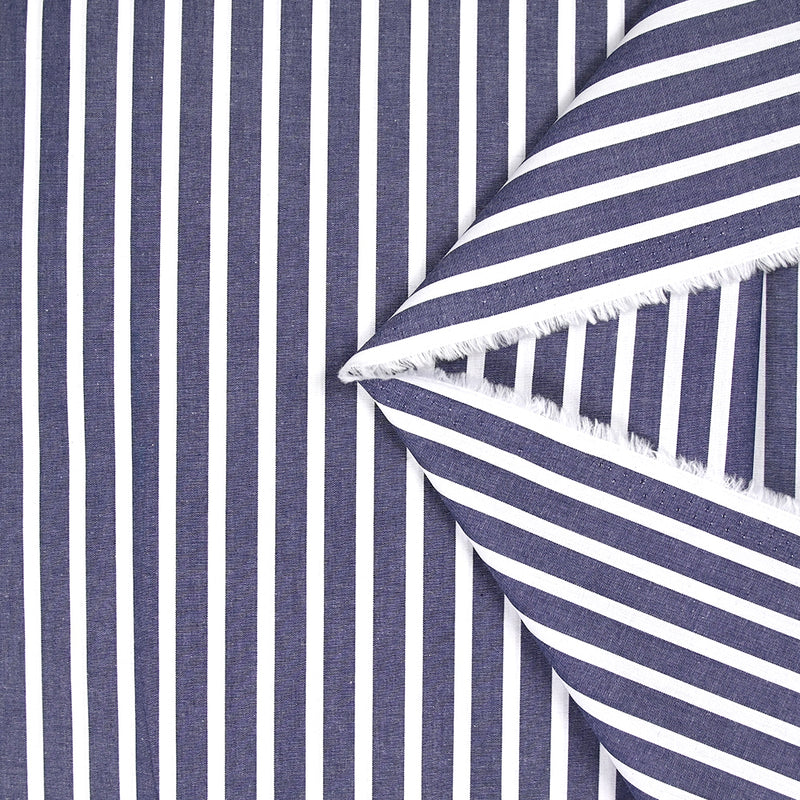 Coton tissé teint rayure large bleue marine fond blanc