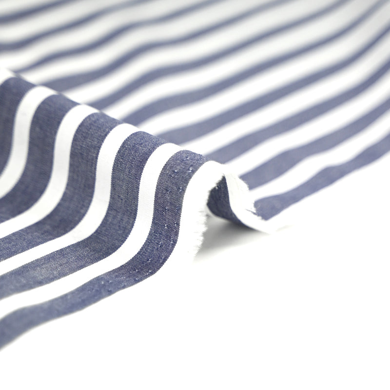Coton tissé teint rayure large bleue marine fond blanc