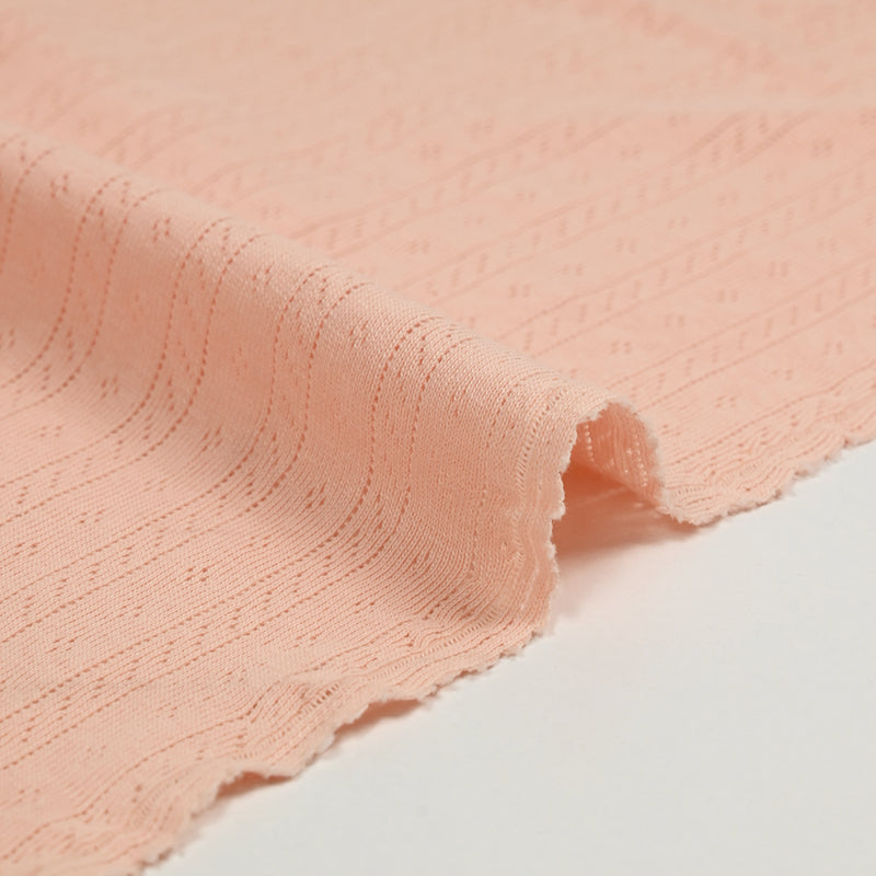 Jersey pointelle 100% coton saumon