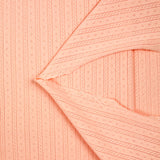 Jersey pointelle 100% coton saumon