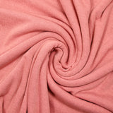 Jersey de polyester côtelé et gratté rose incarnadin