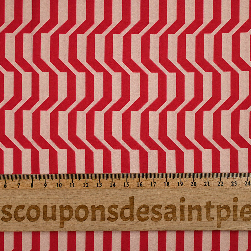 Polyester imprimé graphique raffiné rouge fond beige