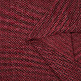 Maille tricot chevrons métallisée doré fond framboise