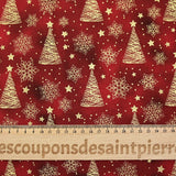 Cotton poplin printed with golden fir trees on a red marbled background