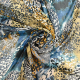 Mousseline imprimée esprit savane fond bleu