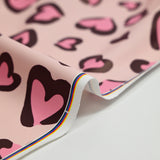 Tissu imperméable déperlant imprimé petit coeur rose