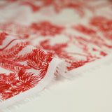 Coton tissé aspect lin imprimé balade tigrée rouge fond blanc