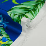 Satin polyester imprimé jardin botanique fond bleu roi