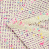 Mezcla de lana tweed confeti rosa y azul fondo morado