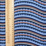Gasa doble estampada onda y pluma azul naranja