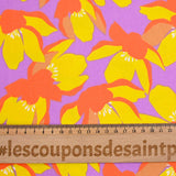 Satin de coton élasthanne fleurs orange fond violet