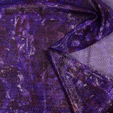 Maille polyester lamée psychédélique fond violet