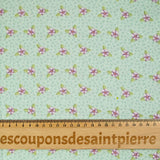 Coton imprimé mini fleurs violette fond vert