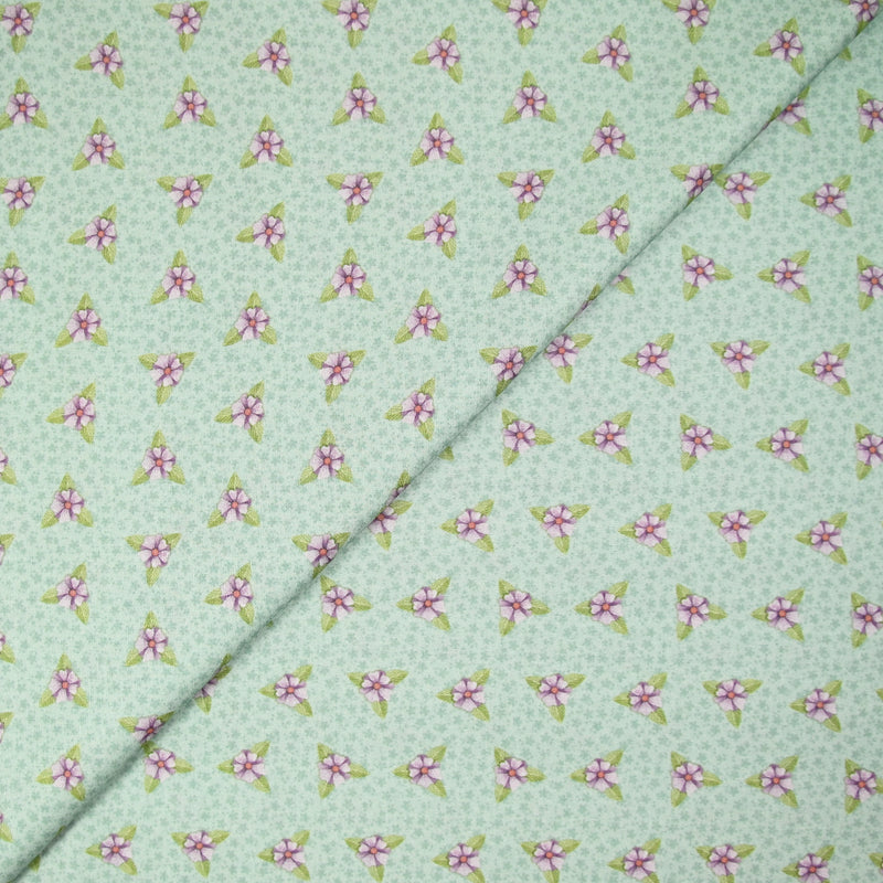 Coton imprimé mini fleurs violette fond vert