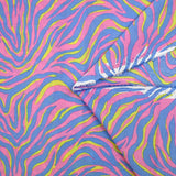 Coton imprimé zèbre jaune et bleu fond rose