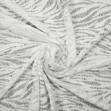 Maille dentelle ajourée feuillage blanc fond blanc