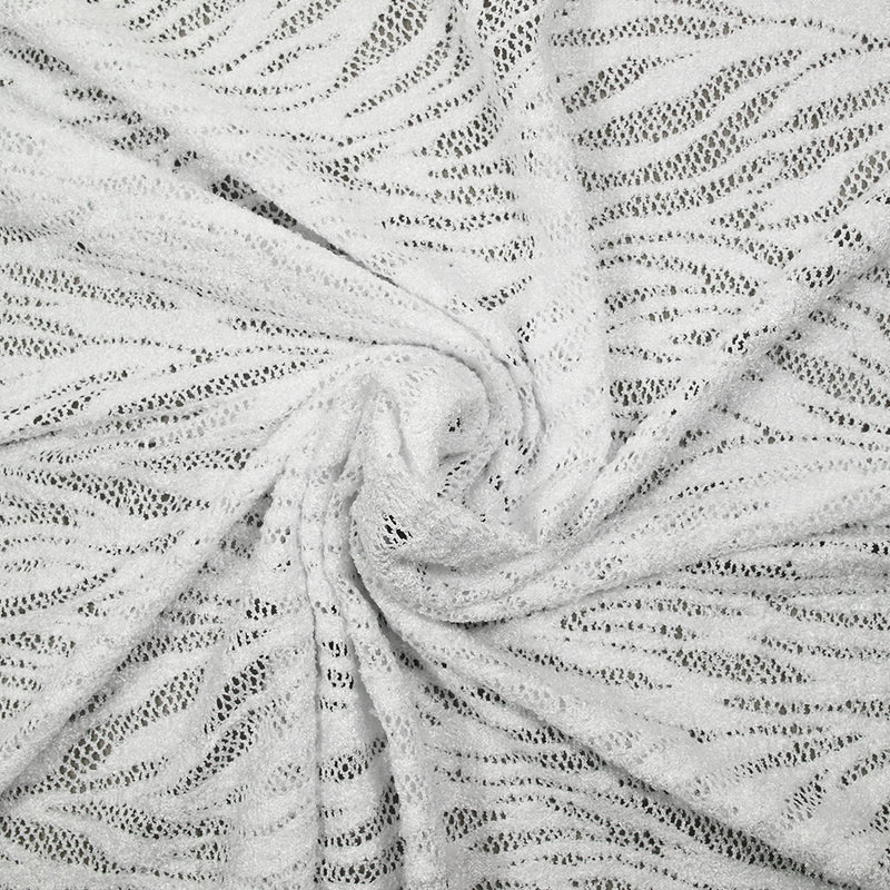 Maille dentelle ajourée feuillage blanc fond blanc