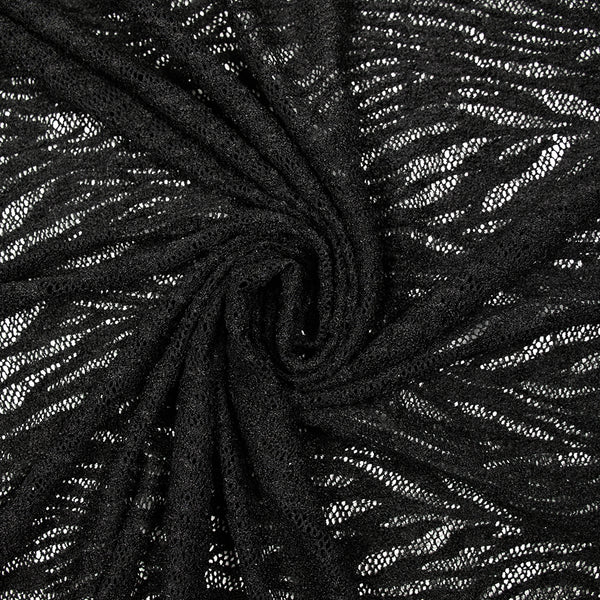 Maille dentelle ajourée feuillage fond noir