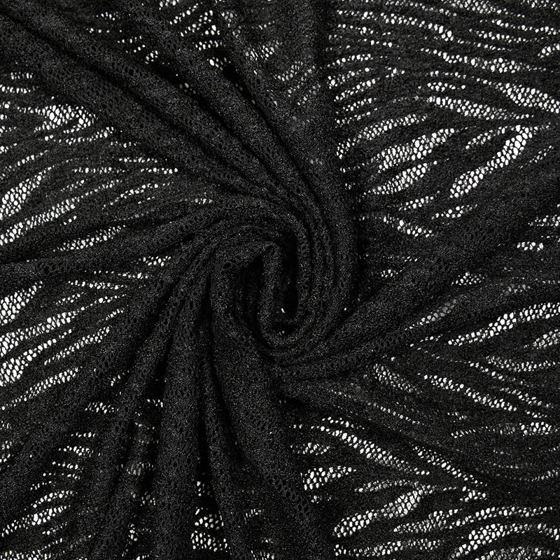 Maille dentelle ajourée feuillage fond noir