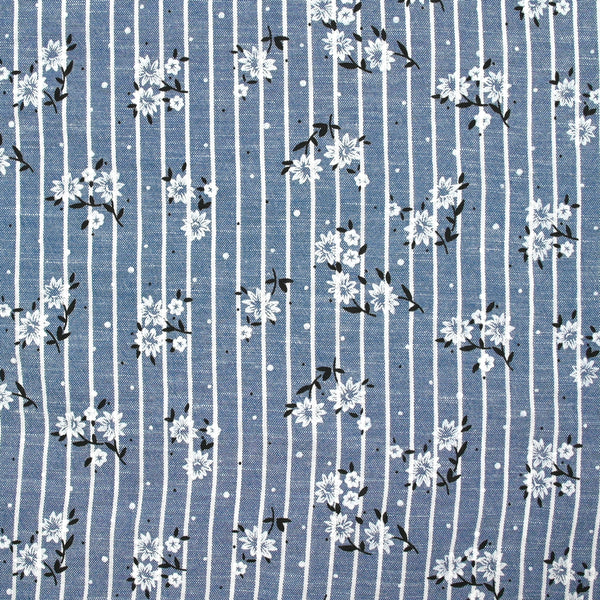 Chambray polyester rayé floqué fleurs fond bleu