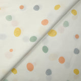 Coton imprimé à pois dessinés pastel fond blanc