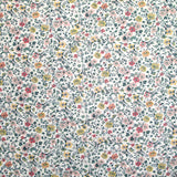 Coton imprimé Aurora fleurs rose et jaune fond blanc au mètre