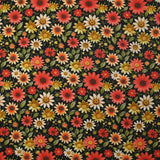 Cotton printed field of daisies black background
