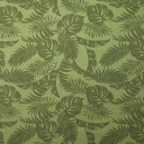 Coton imprimé envolée de feuilles fond vert