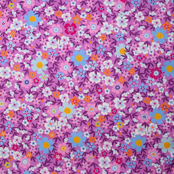 Coton imprimé fleurs de Ambre fond violet