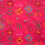 Coton imprimé fleurs fond magenta