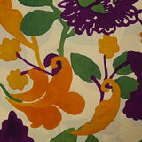 Coton imprimé fleurs orange et violet fond beige