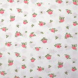 Coton imprimé les fleurs de Lou rose fond blanc