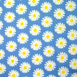 Coton imprimé marguerite fond bleu