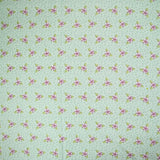 Coton imprimé mini fleurs violette fond vert