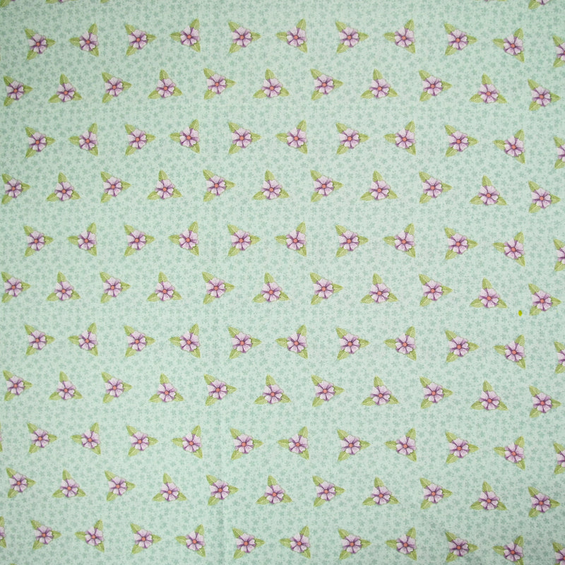 Coton imprimé mini fleurs violette fond vert