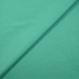 Coton imprimé mini pois fond turquoise