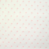 Coton imprimé noeud rose fond blanc